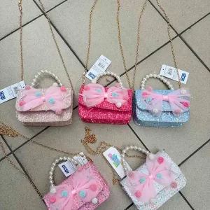 Torebki mini damskie CB z perełkami i kokardami różowo-niebieskie Nie przegap